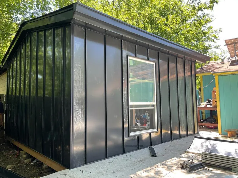 Black standing seam metal wall panels for Roof Inspection in Saugus