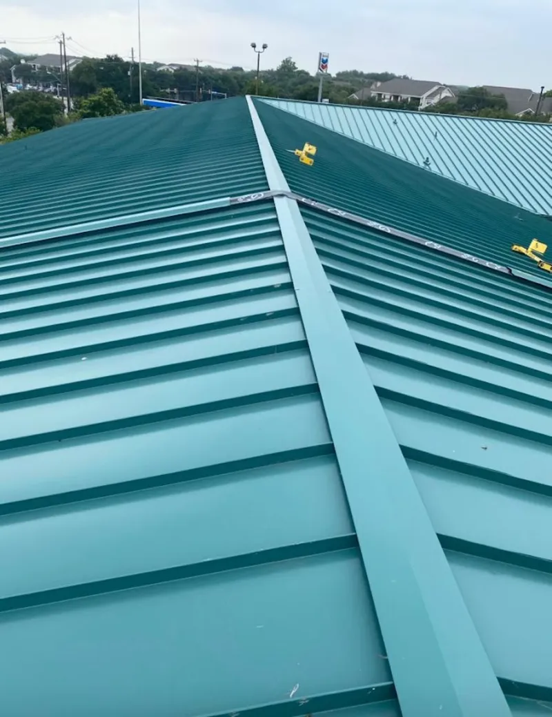 Green commercial metal roof ridge and valley for Metal Roof Repair in Saugus